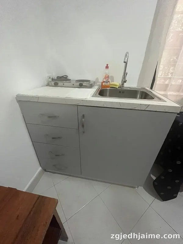 GARSIONERE 25000 LEKE.VILAT AMERIKANE